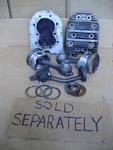 Onan P224G Head, Piston & Rod, Oil Pump, Crankshaft Gear Washer, Thrust Set Used. Price: $28.00.